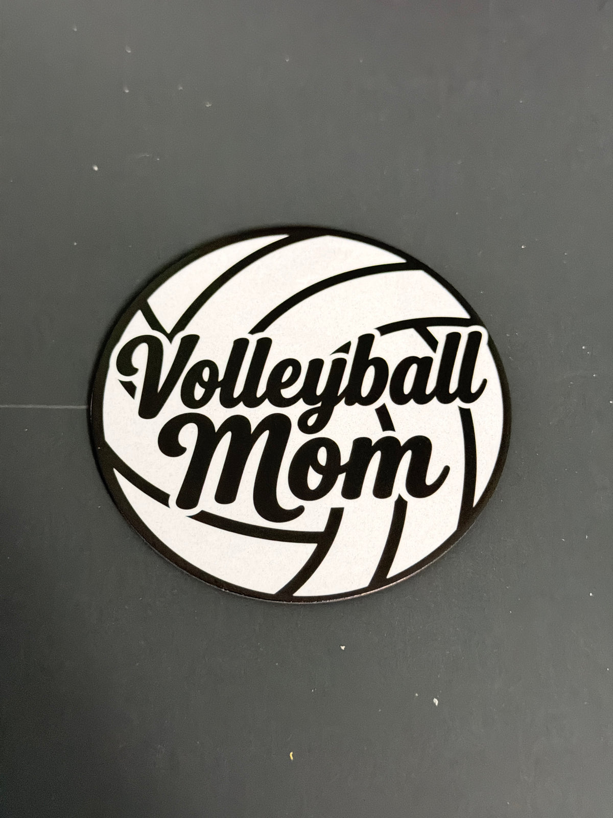 Round printed magnet with volleyball design and Volleyball Mom text